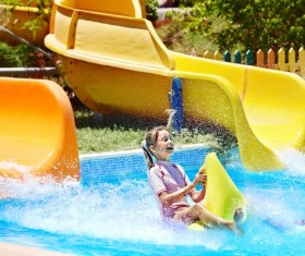 Happy little girl playing in water amusement park Stock Photo 04