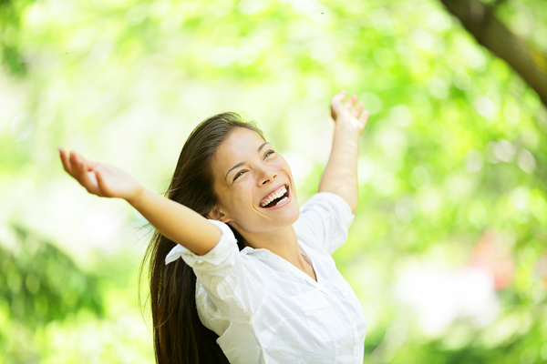 Happy woman in nature Stock Photo