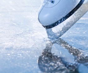 Ice skates on the ice Stock Photo 02