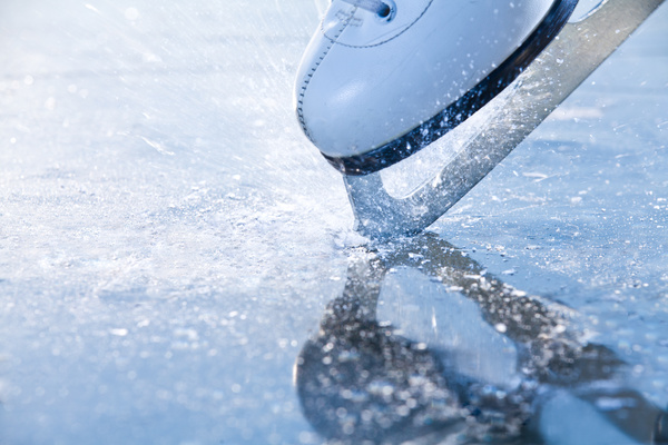 Ice skates on the ice Stock Photo 02