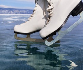 Ice skates on the ice Stock Photo 03