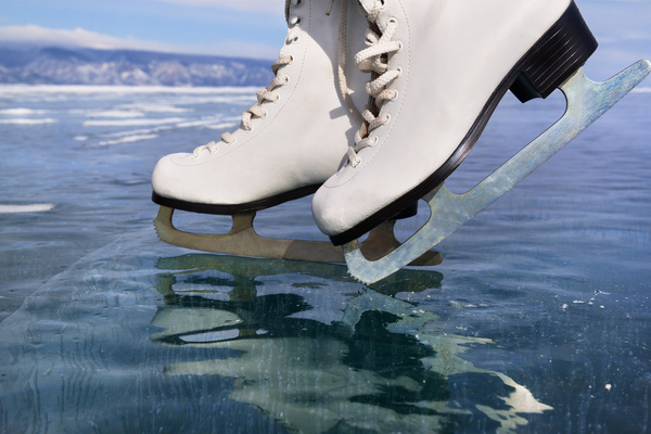 Ice skates on the ice Stock Photo 03