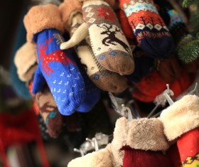 Knitted mittens with Christmas motifs Stock Photo