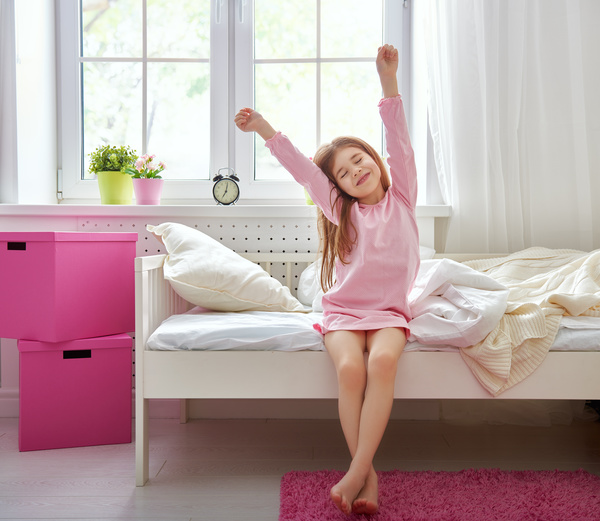 Little girl getting up Stock Photo