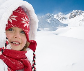 Little girl having fun in ski resort Stock Photo