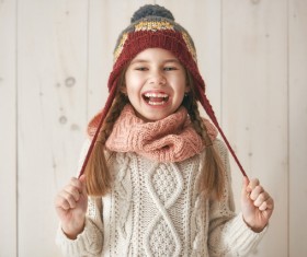 Little girl in knit sweater Stock Photo