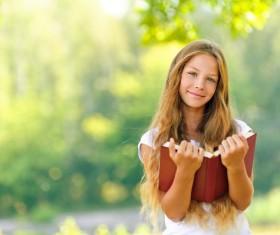 Little girl reading book Stock Photo