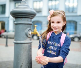 Little girl washing hands Stock Photo