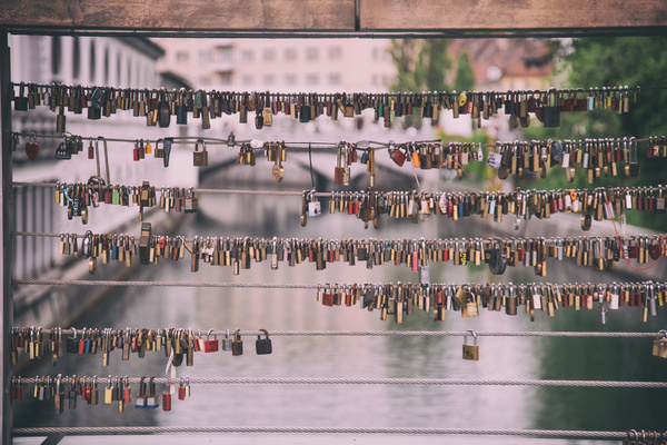 Love locks hung on bridge Stock Photo