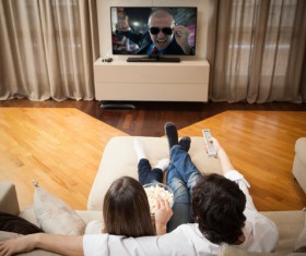 Lovers watching TV Stock Photo 02