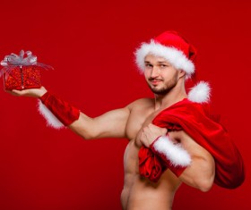 Man holding Christmas present Stock Photo