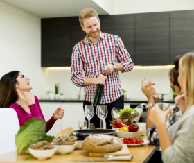 Man opening red wine Stock Photo