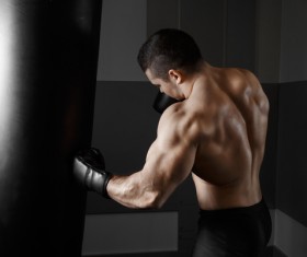 Man playing sandbag Stock Photo 02