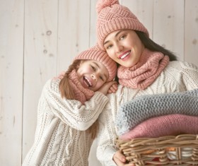 Mother and daughter wearing knit sweaters Stock Photo 02