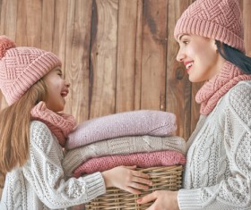 Mother and daughter wearing knit sweaters Stock Photo 03