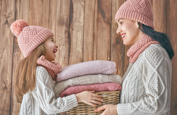 Mother and daughter wearing knit sweaters Stock Photo 03