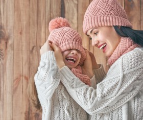 Mother and daughter wearing knit sweaters Stock Photo 04