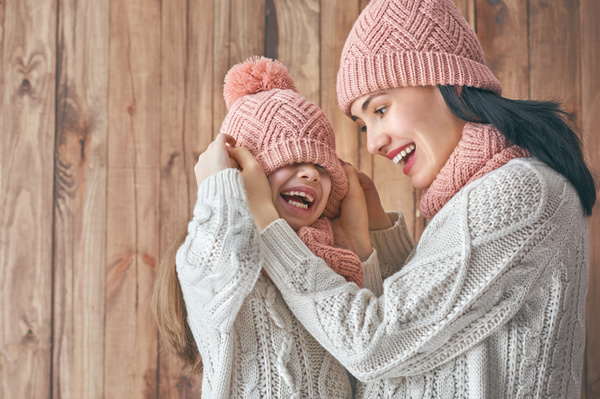 Mother and daughter wearing knit sweaters Stock Photo 04