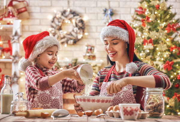 Mother and daughter who make Christmas food in the kitchen Stock Photo 01