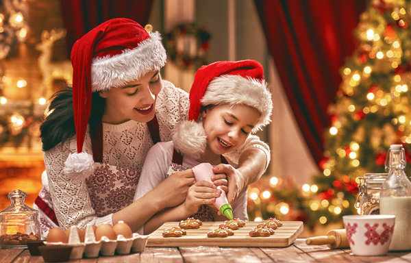 Mother and daughter who make Christmas food in the kitchen Stock Photo 02