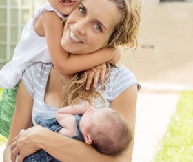 Mother holding baby Stock Photo