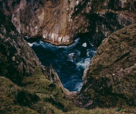 Mountain cliff and beach scene Stock Photo