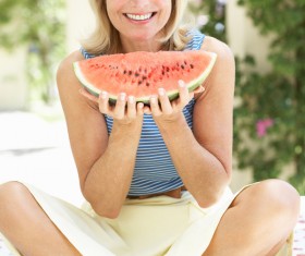 Older people eat watermelon Stock Photo