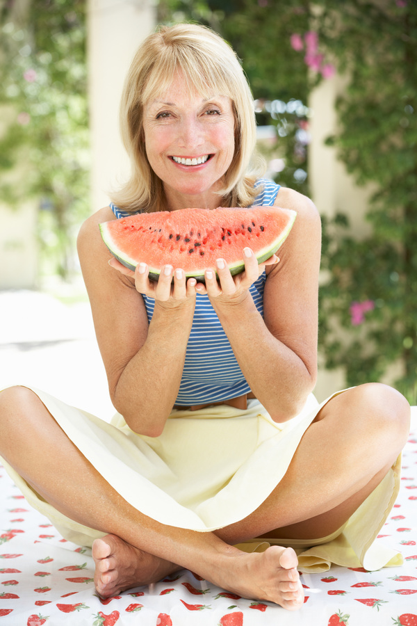 Older people eat watermelon Stock Photo