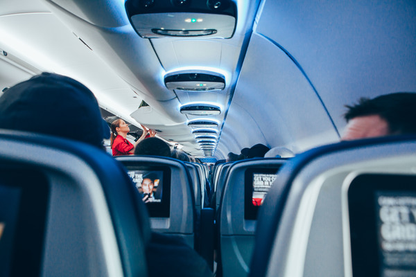 Passengers on modern airplane Stock Photo