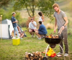 Point camping bonfire man Stock Photo