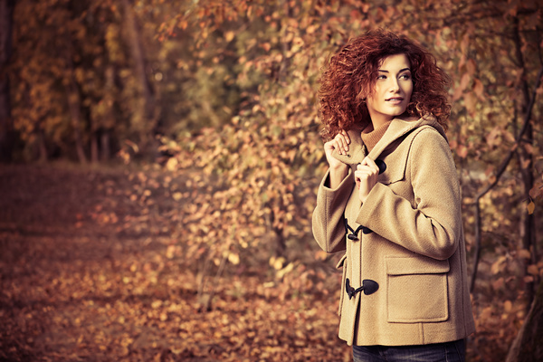 Red haired girl walking in the autumn park Stock Photo 01