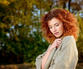 Red haired girl walking in the autumn park Stock Photo 02