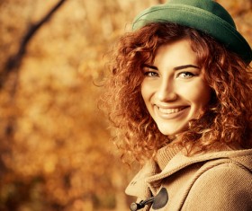 Red haired girl walking in the autumn park Stock Photo 03