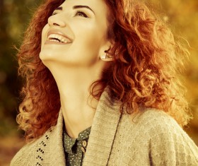 Red haired girl walking in the autumn park Stock Photo 04