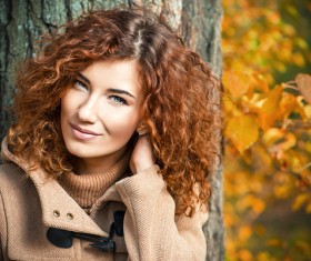 Red haired girl walking in the autumn park Stock Photo 05