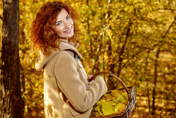 Red haired girl walking in the autumn park Stock Photo 06