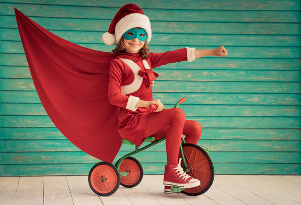 Riding tricycle happy little girl Stock Photo