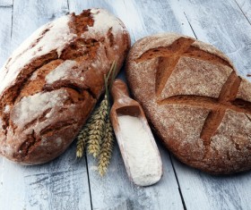 Rye bread and flour on the table Stock Photo