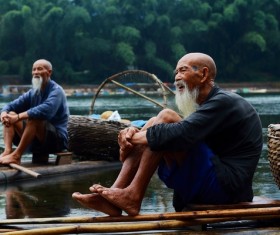 Sitting on the bamboo row of the elderly Stock Photo