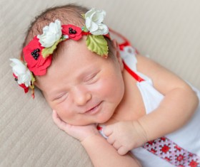 Sleeping baby smiling Stock Photo 01