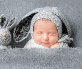 Sleeping baby smiling Stock Photo 02