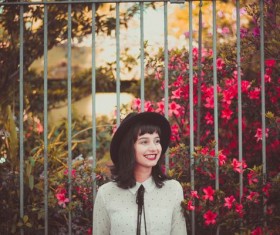 Smiling lady in black top hat Stock Photo