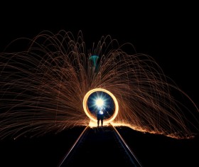 Sparkling bright explosion firework at night Stock Photo