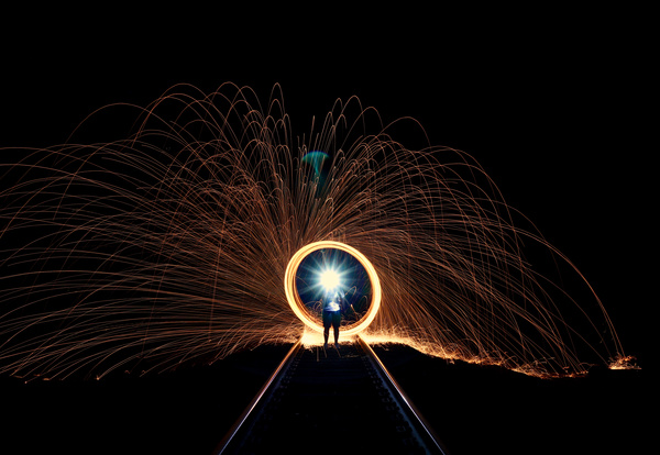 Sparkling bright explosion firework at night Stock Photo