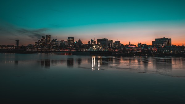 Sparkling modern city on riverside Stock Photo