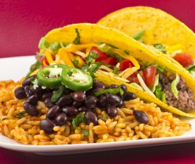 Tasty snacks tortillas and beans rice Stock Photo