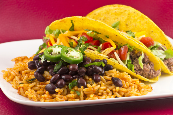 Tasty snacks tortillas and beans rice Stock Photo