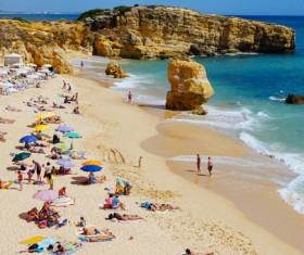 Tourist relaxing on beautiful beach Stock Photo