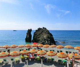 Umbrellas on the beach Stock Photo 04