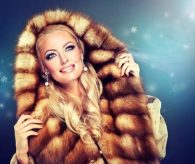 Wearing a fur coat woman Stock Photo
